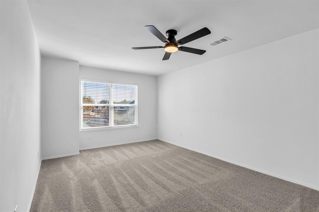 906 Thistle Circle Allen, TX 75002 - Photo 28 of 40 a view of an empty room with a window