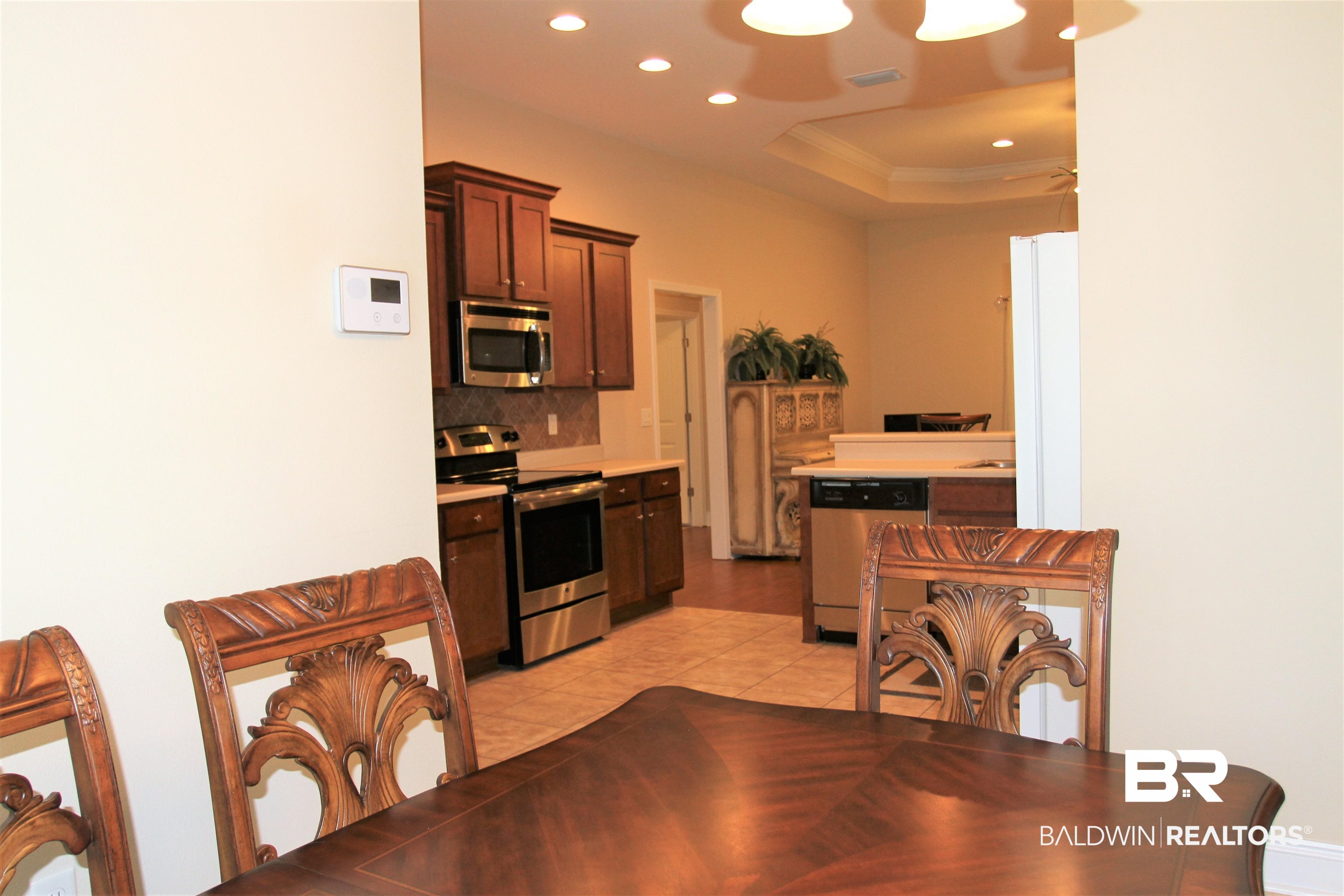14620 Silvermere Drive Foley, AL 36535 - Photo 4 of 27 Dining and Kitchen view.