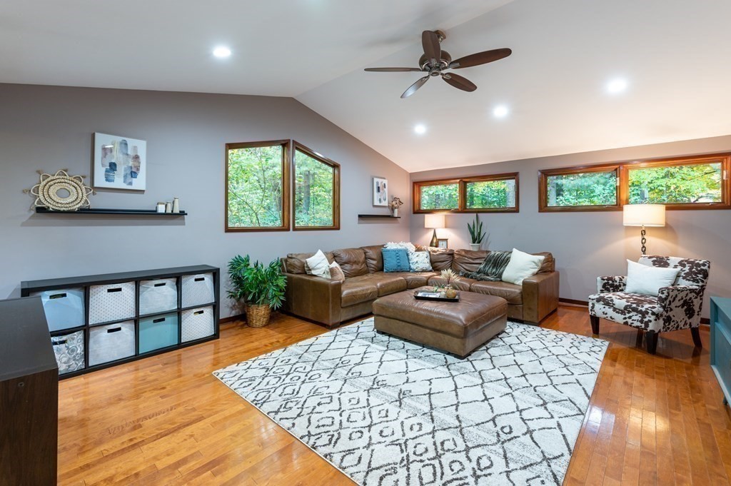 12 Rice Spring Lane Wayland, MA 01778 - Photo 14 of 37 a living room with furniture and a large window