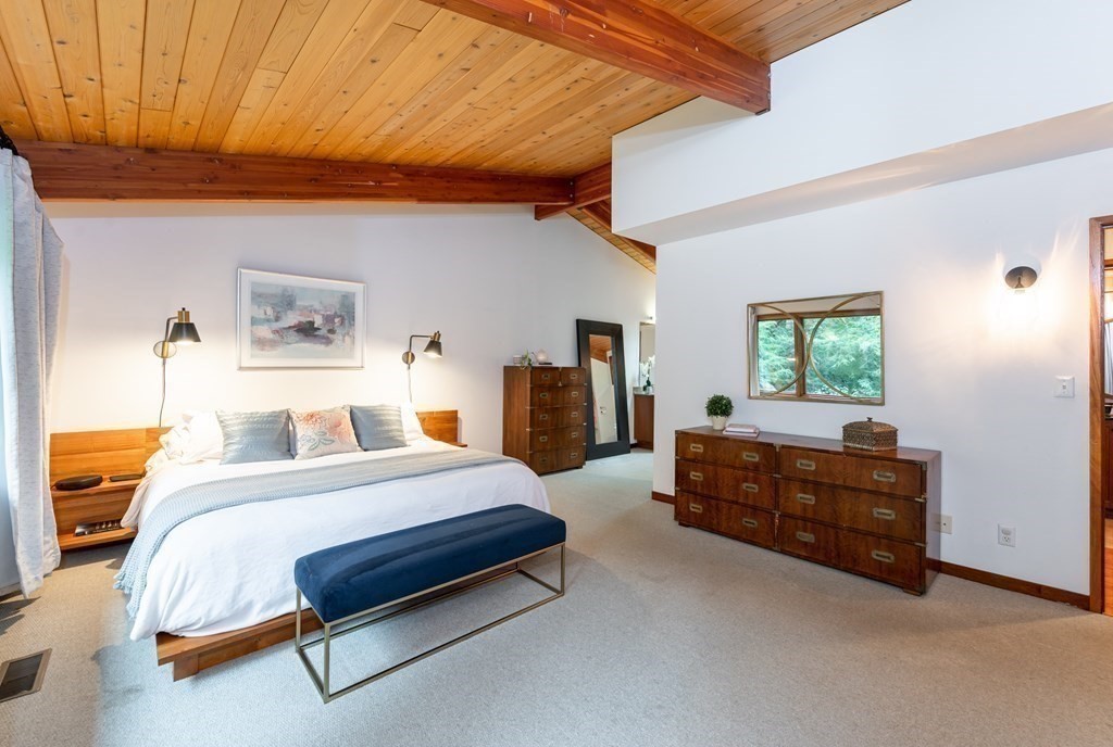 12 Rice Spring Lane Wayland, MA 01778 - Photo 16 of 37 a bedroom with a bed and window