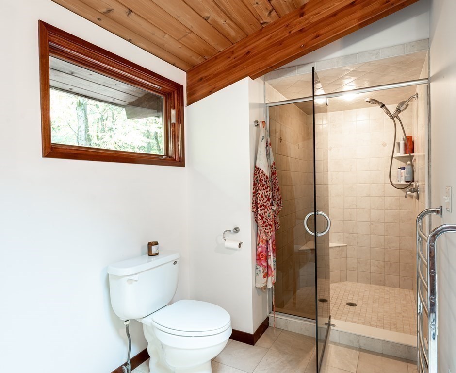 12 Rice Spring Lane Wayland, MA 01778 - Photo 20 of 37 a bathroom with a toilet and a shower
