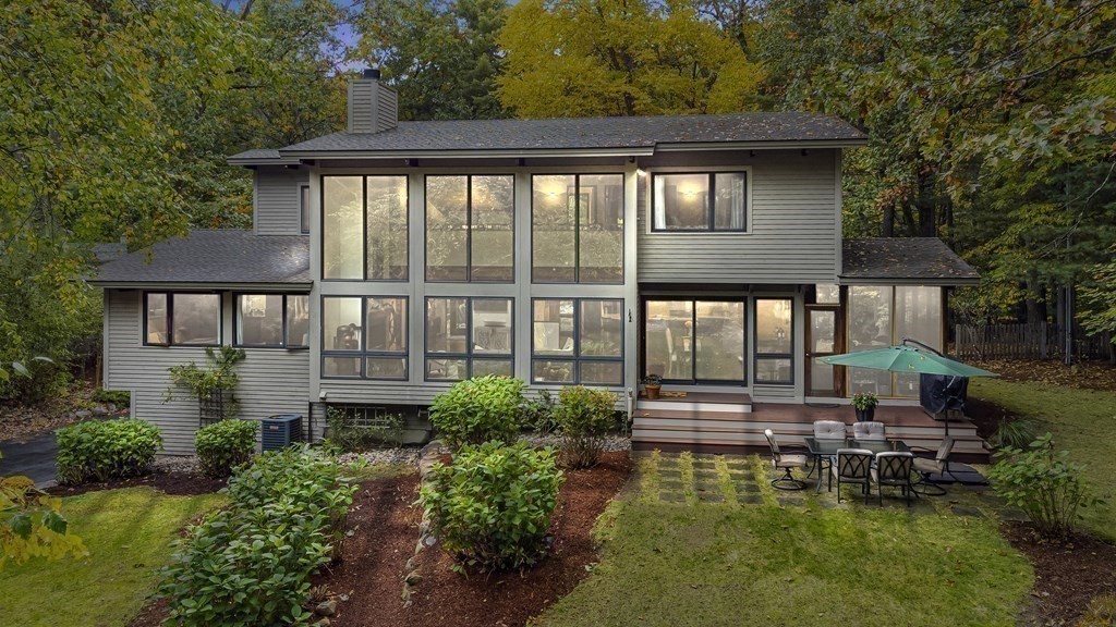 12 Rice Spring Lane Wayland, MA 01778 - Photo 32 of 37 a house view with a garden space