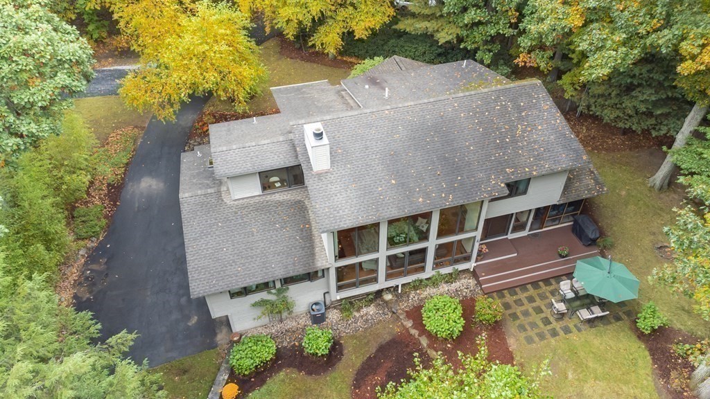 12 Rice Spring Lane Wayland, MA 01778 - Photo 33 of 37 an aerial view of a house with a yard and large tree