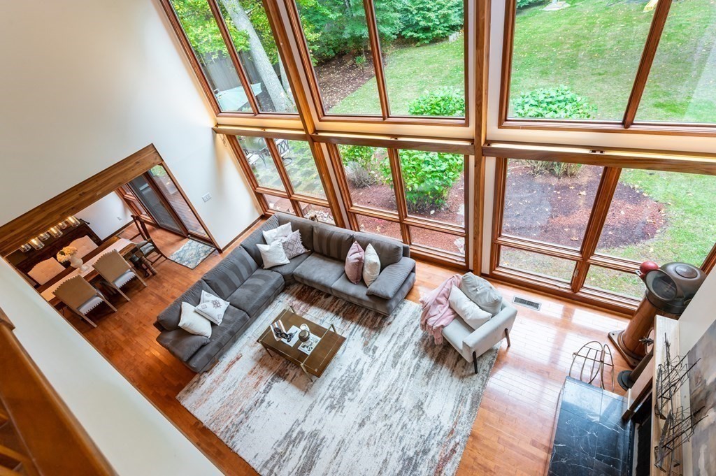 12 Rice Spring Lane Wayland, MA 01778 - Photo 4 of 37 a living room with furniture and a floor to ceiling window