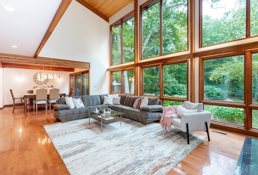 12 Rice Spring Lane Wayland, MA 01778 - Photo 6 of 37 a living room with furniture and a large window
