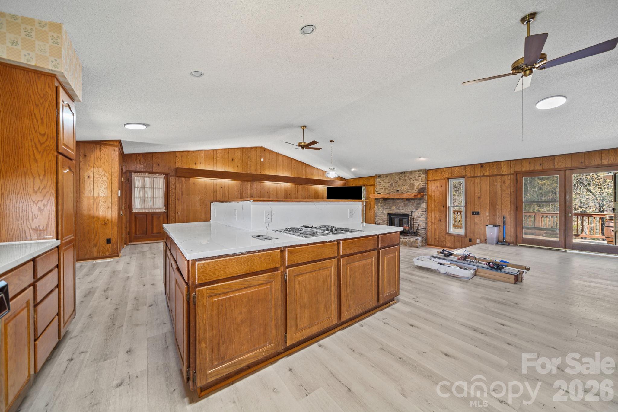 235 Spring Estates Circle Salisbury, NC 28146 - Photo 16 of 47 a kitchen with stainless steel appliances granite countertop a sink stove and wooden cabinets