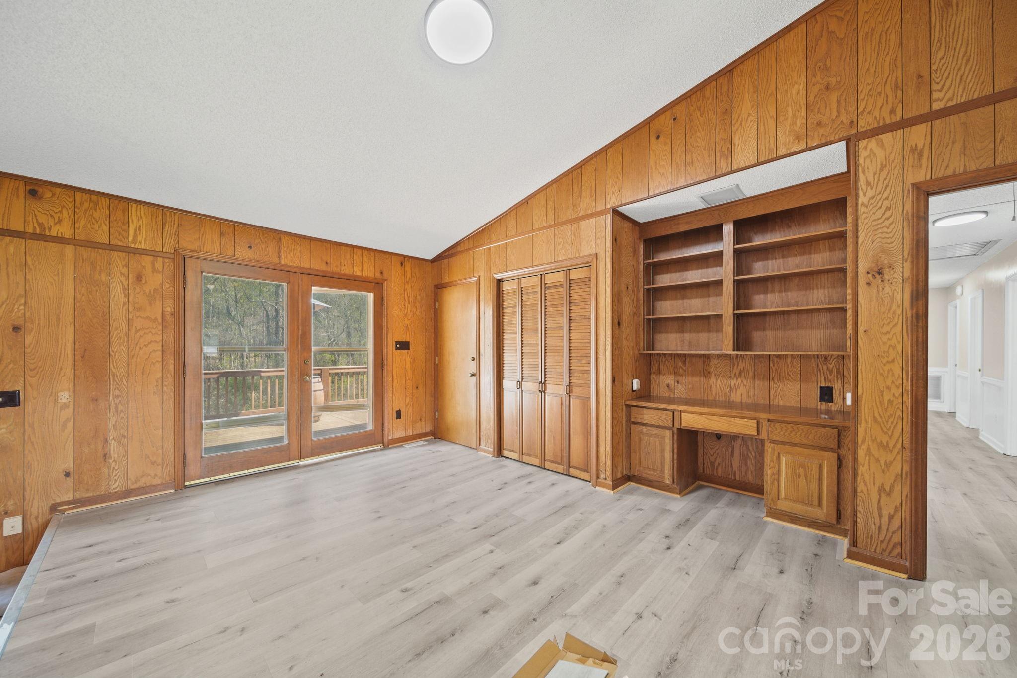 235 Spring Estates Circle Salisbury, NC 28146 - Photo 19 of 47 a view of empty room with cabinet and wooden floor