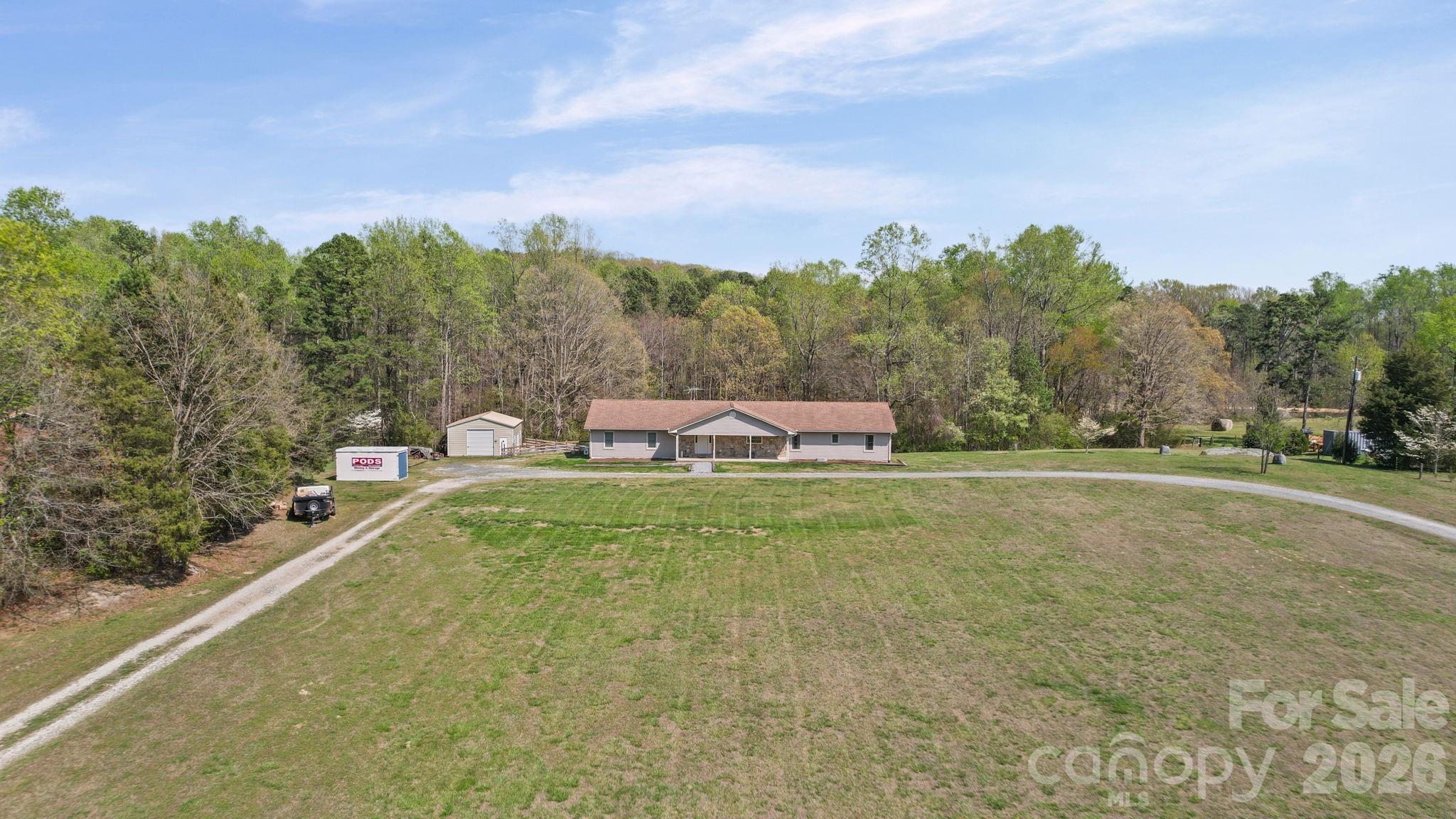 235 Spring Estates Circle Salisbury, NC 28146 - Photo 2 of 47 a view of a terrace with yard