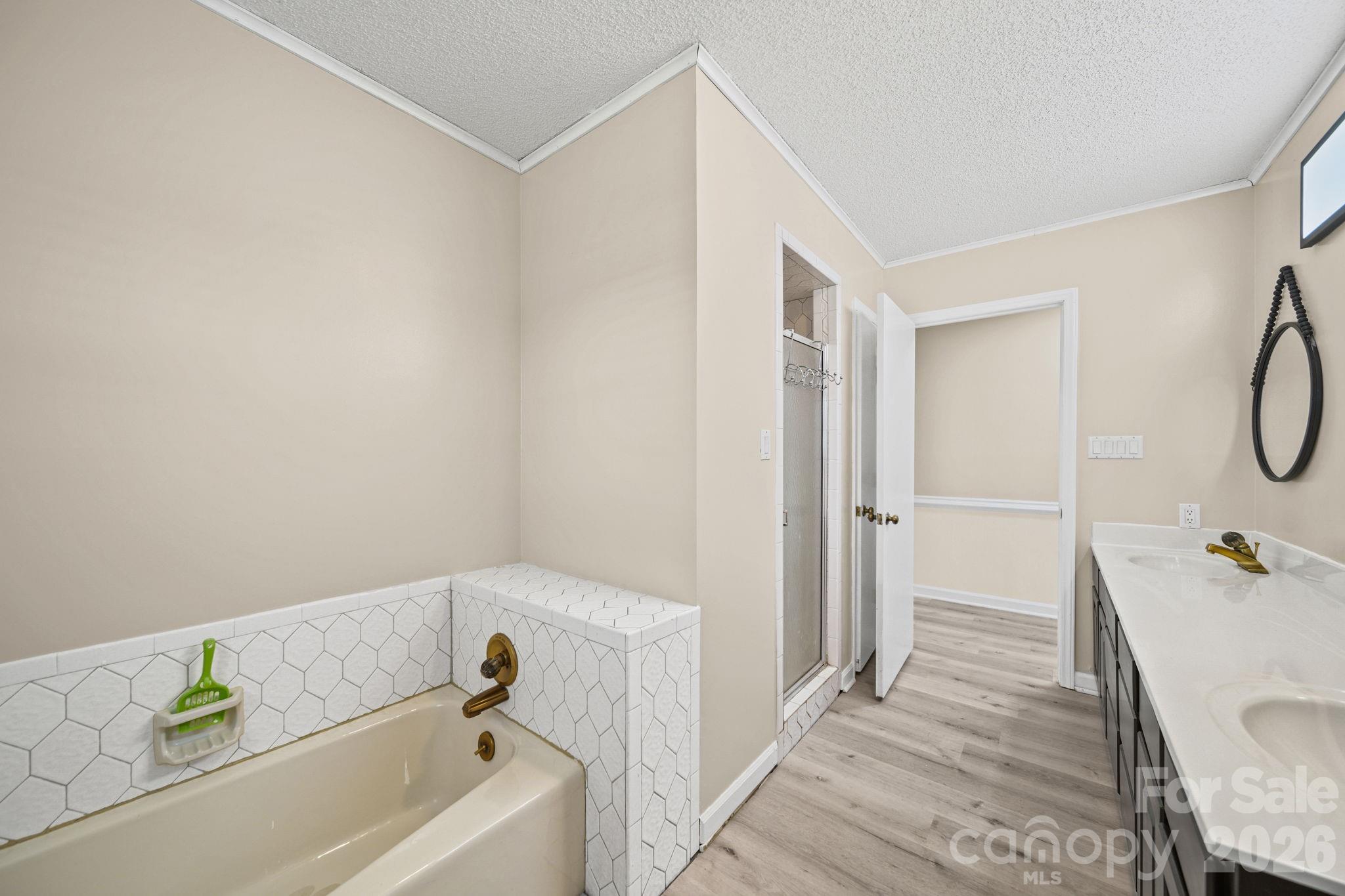 235 Spring Estates Circle Salisbury, NC 28146 - Photo 27 of 47 a bathroom with a bathtub and a shower