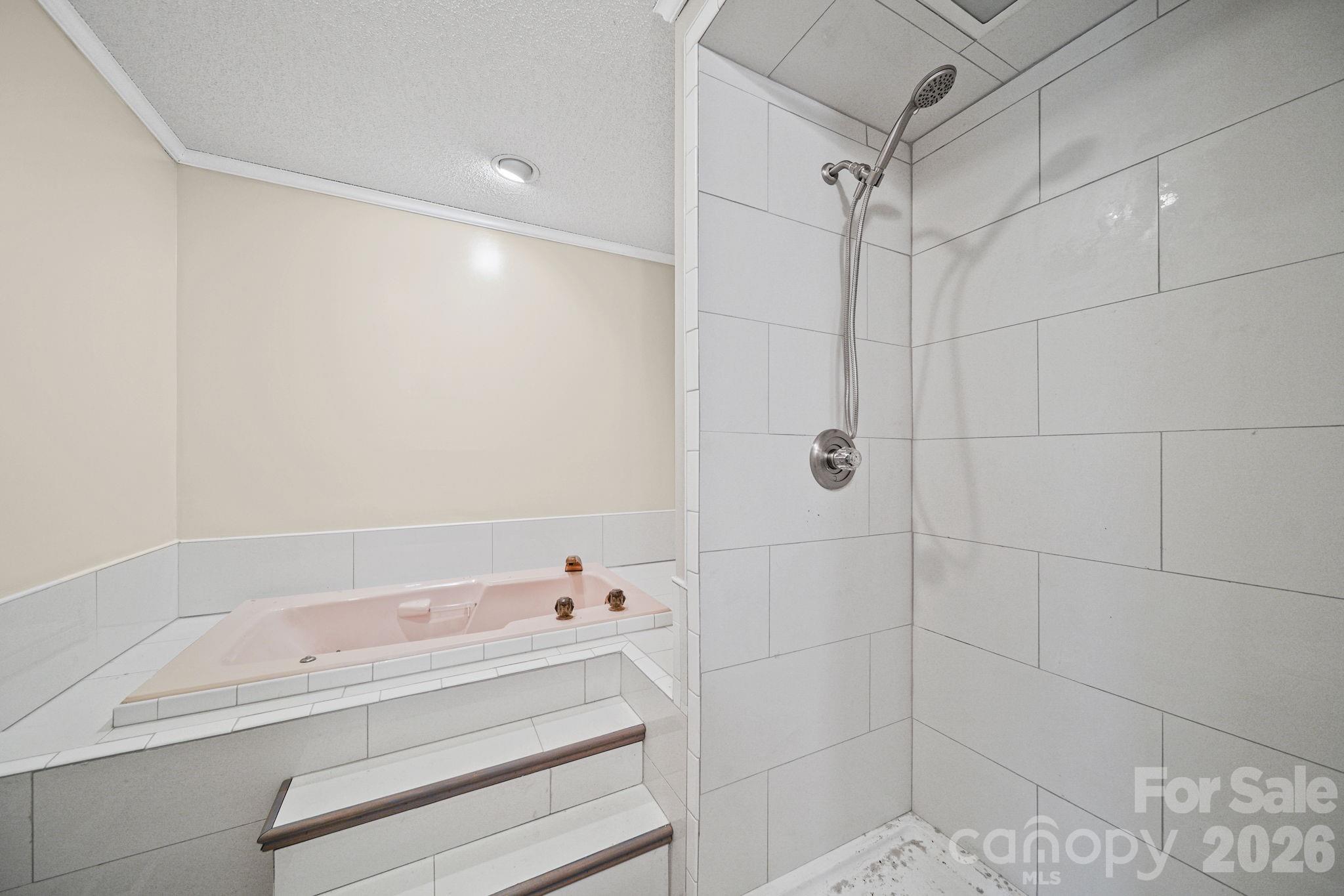235 Spring Estates Circle Salisbury, NC 28146 - Photo 32 of 47 a bathroom with a bathtub and shower