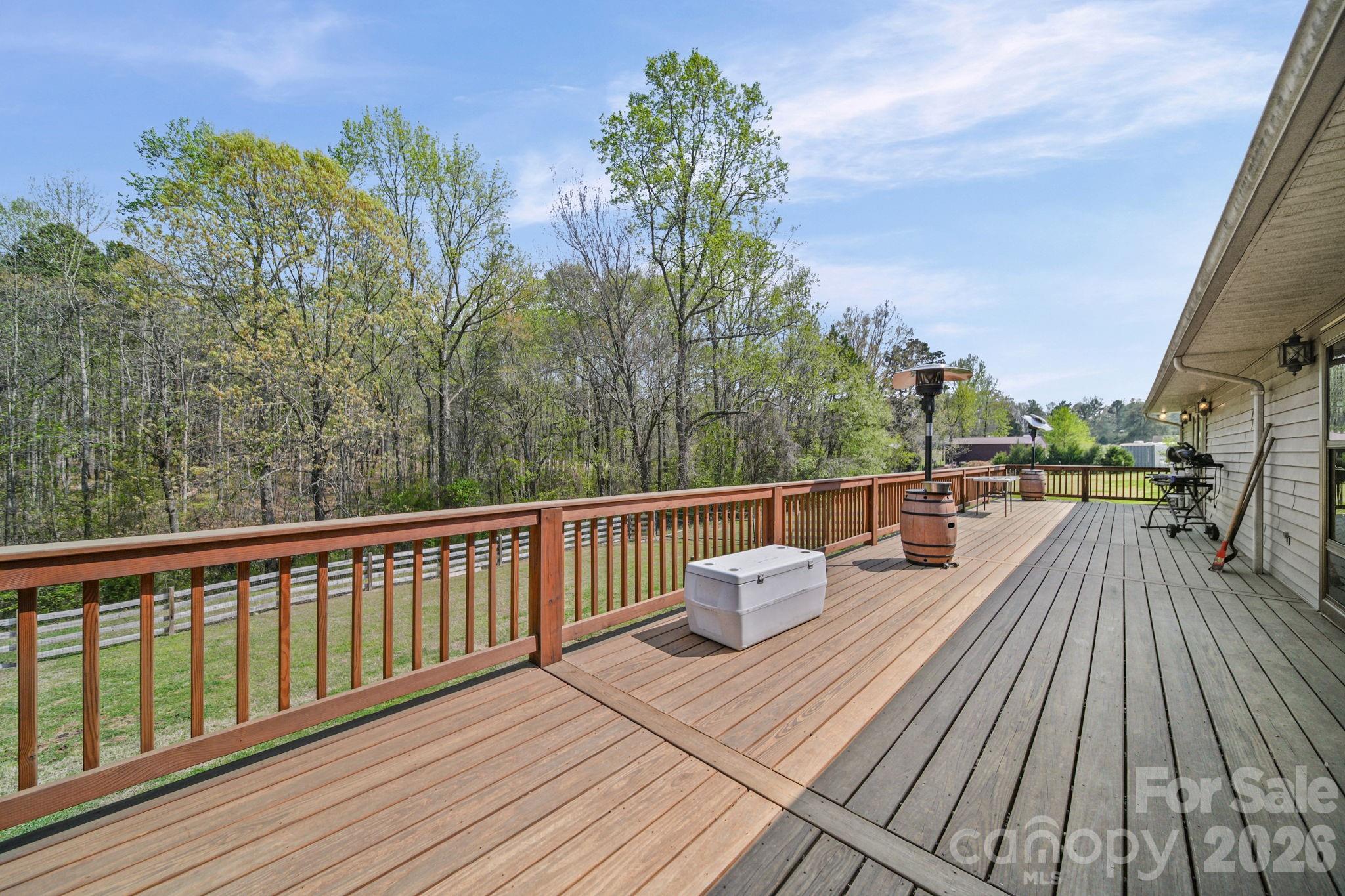 235 Spring Estates Circle Salisbury, NC 28146 - Photo 34 of 47 a view of roof deck with wooden floor and seating