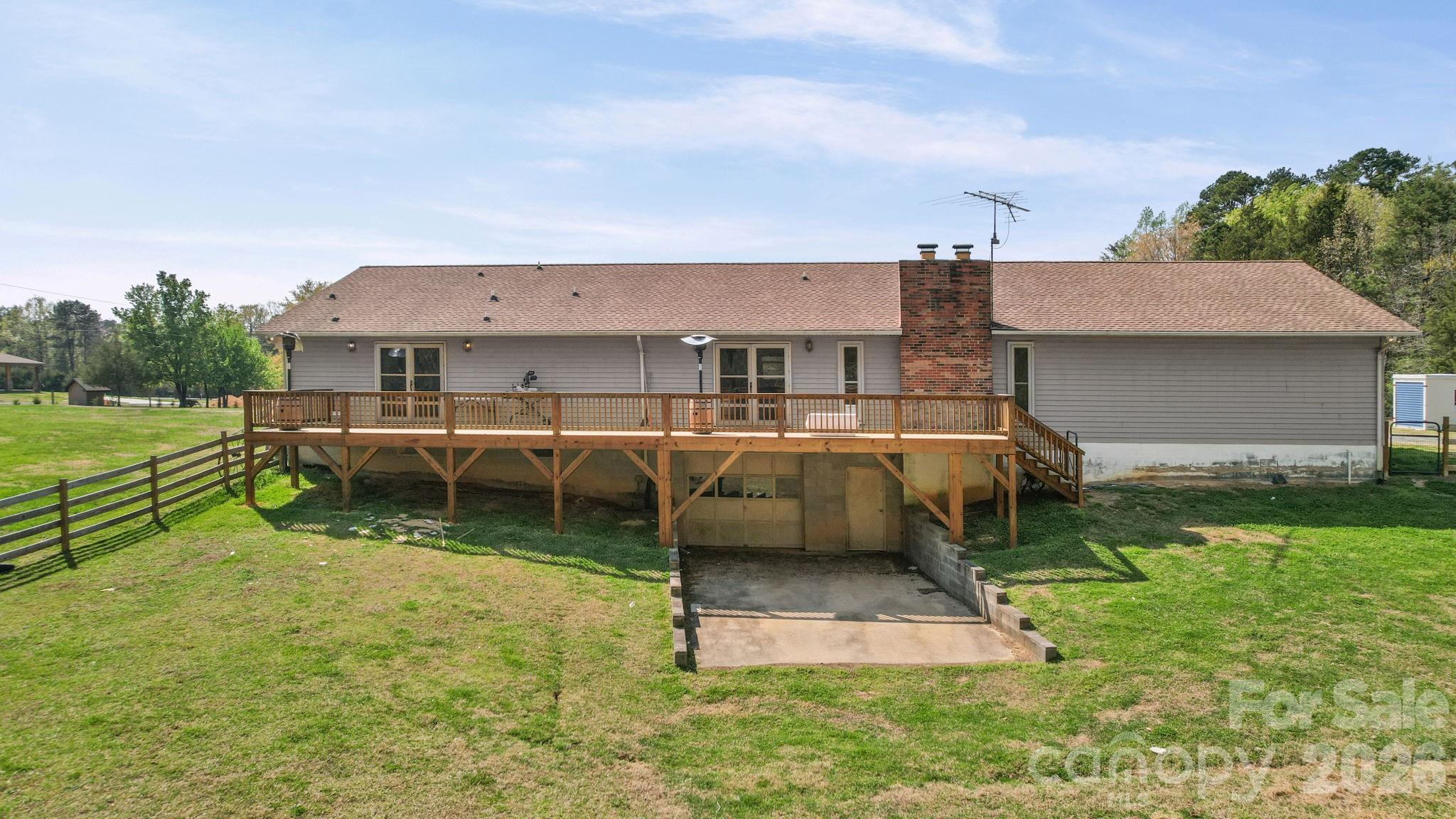 235 Spring Estates Circle Salisbury, NC 28146 - Photo 6 of 47 a backyard of a house with yard barbeque oven and outdoor seating