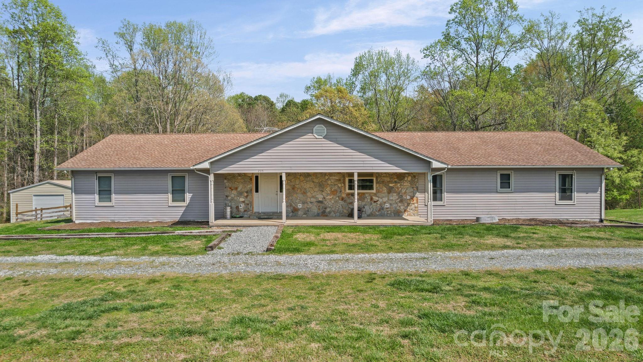 235 Spring Estates Circle Salisbury, NC 28146 - Photo 7 of 47 a front view of a house with a yard