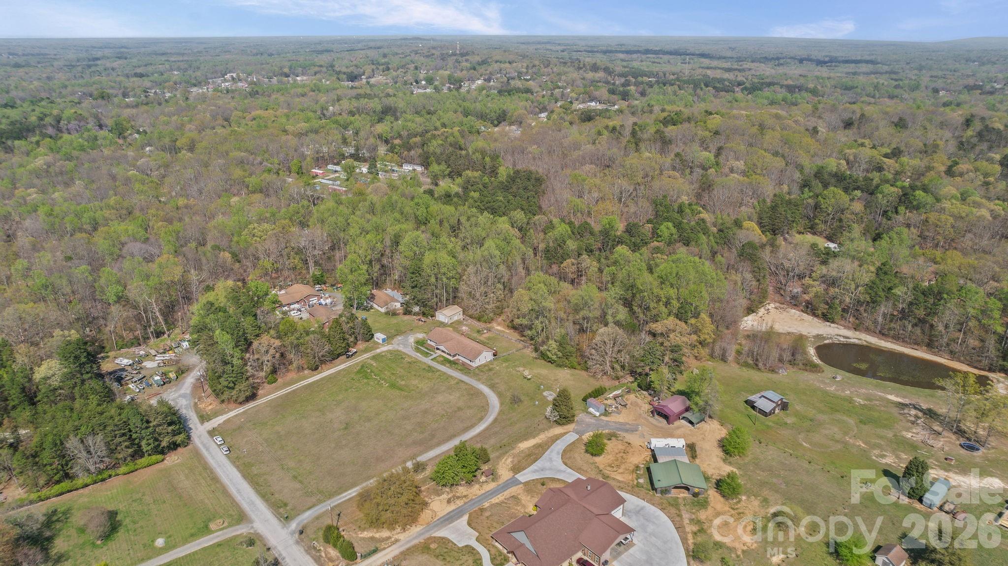 235 Spring Estates Circle Salisbury, NC 28146 - Photo 8 of 47 an aerial view of a house with a yard