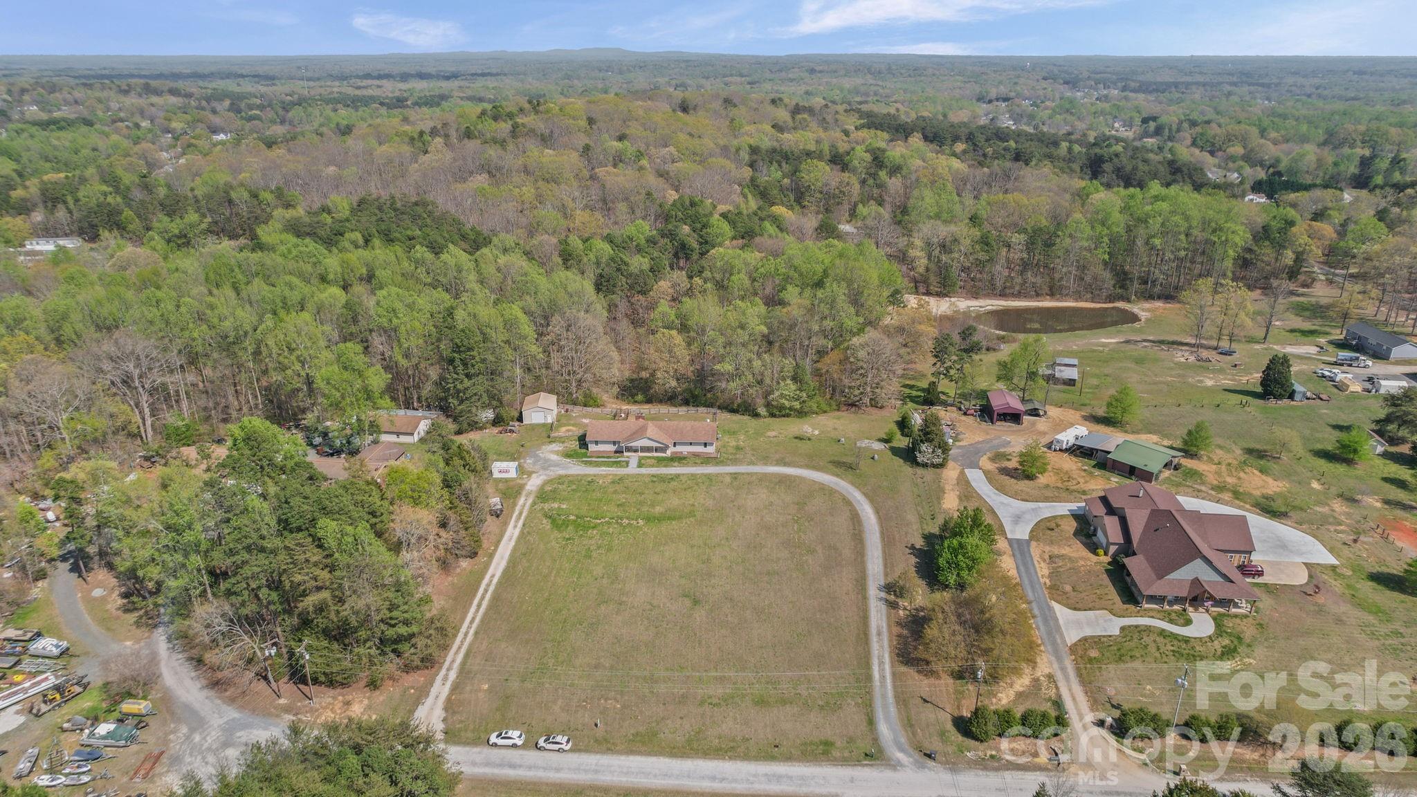 235 Spring Estates Circle Salisbury, NC 28146 - Photo 9 of 47 an aerial view of a house with a yard