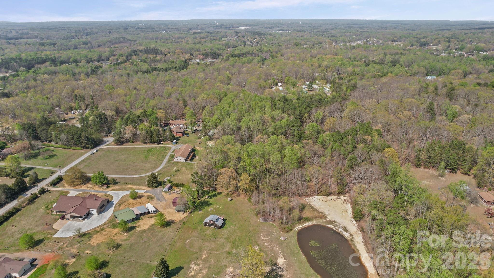 235 Spring Estates Circle Salisbury, NC 28146 - Photo 10 of 47 an aerial view of a house with a yard