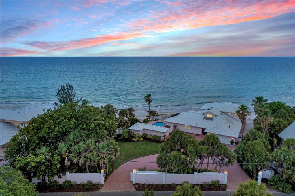 an aerial view of a houses with outdoor space