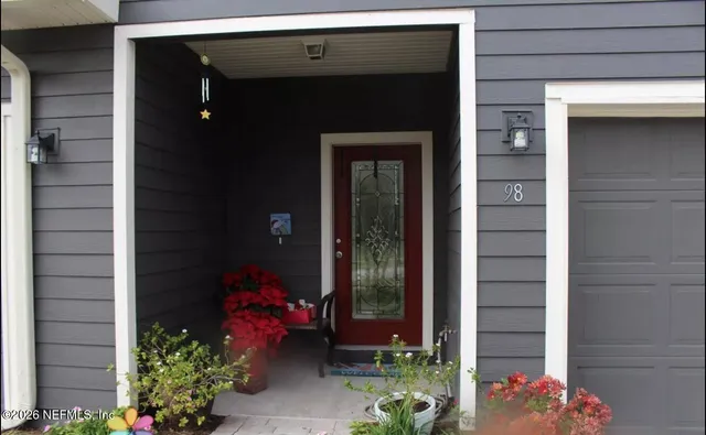 a front view of a house with an outdoor space