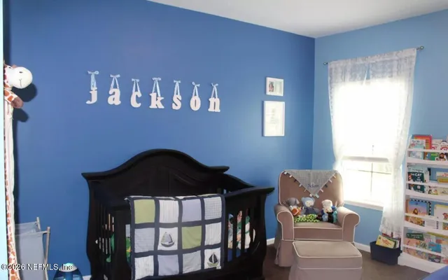 a room with a table and a window