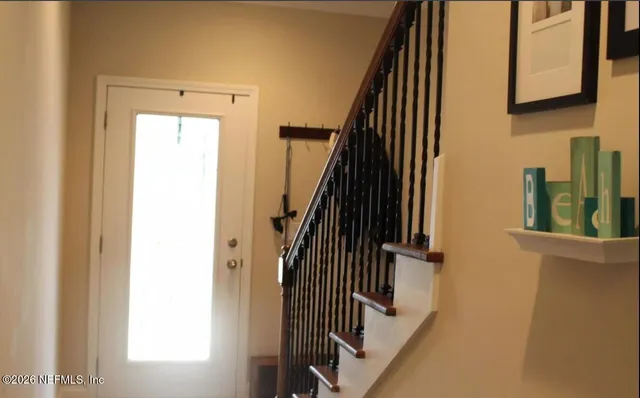 a view of hallway with stairs