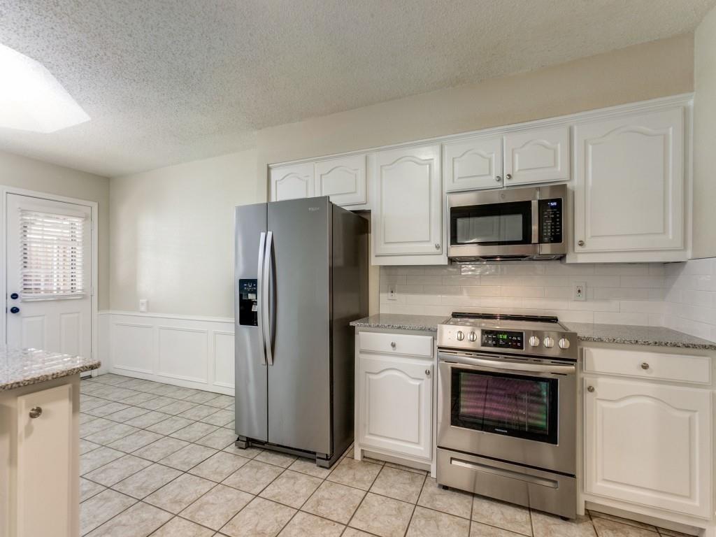 516 Cedar Elm Lane Allen, TX 75002 - Photo 4 of 13 Kitchen with SS appliances