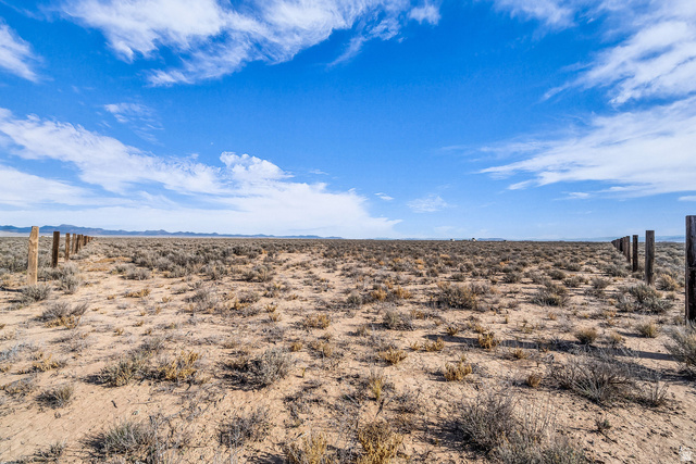 3825 West 5200th Road North Beryl, UT 84714 - Photo 10 of 10 View of nature with a desert landscape and a mountain backdrop