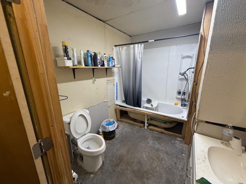 9300 Johns Road Alvarado, TX 76009 - Photo 29 of 40 a bathroom with a granite countertop sink and a mirror