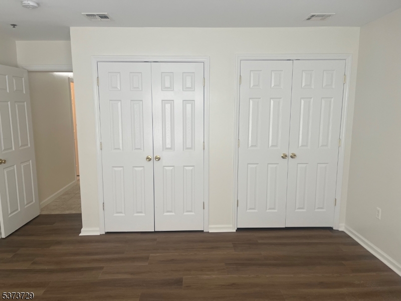 98 Quitman Street Newark, NJ 07102 - Photo 13 of 15 a view of a livingroom with wooden floor