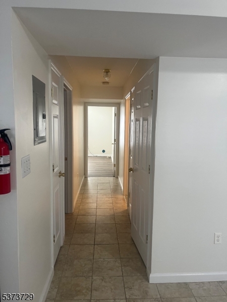 98 Quitman Street Newark, NJ 07102 - Photo 6 of 15 a view of a hallway