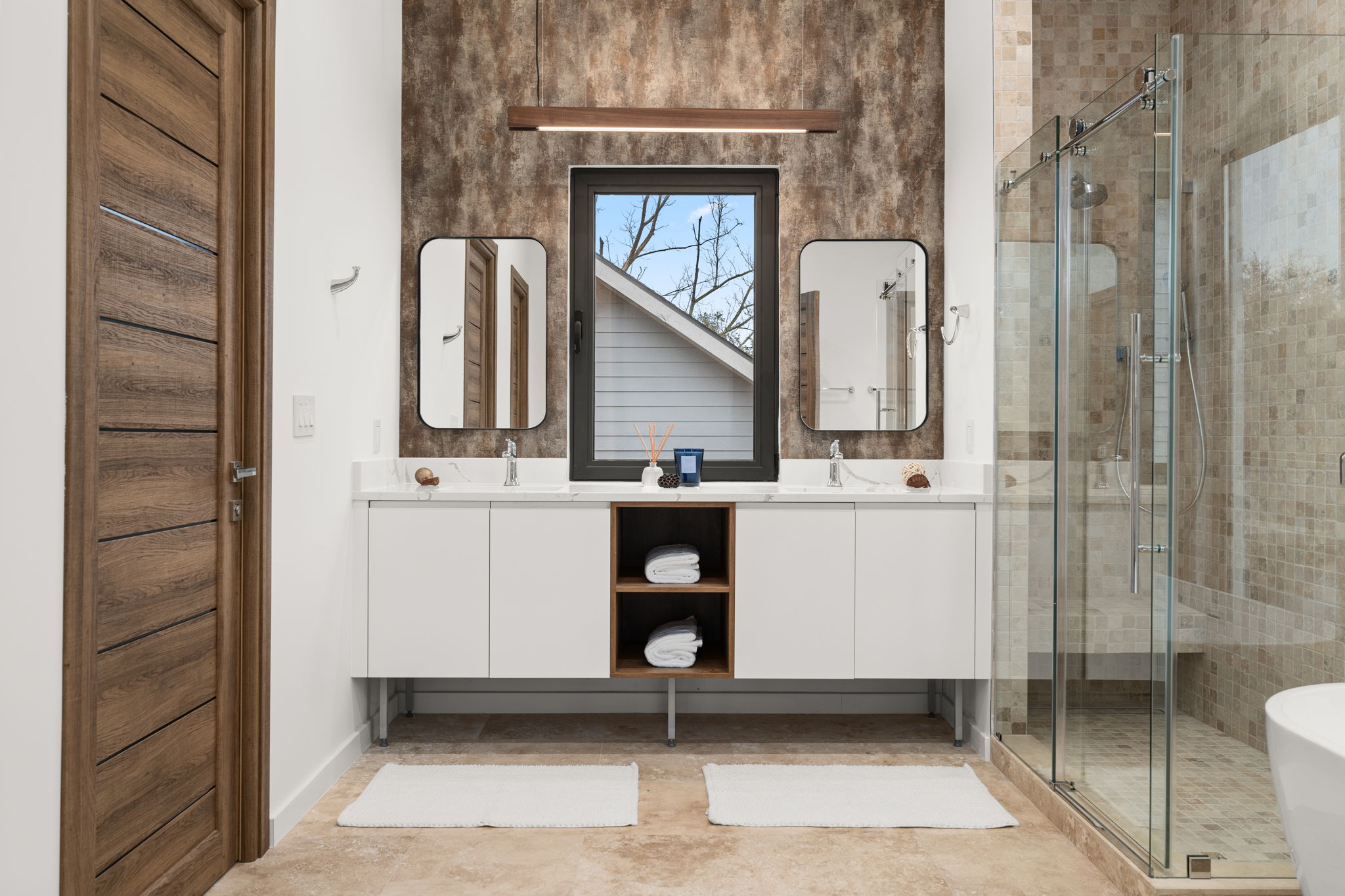 2915 Chisholm Trail Austin, TX 78734 - Photo 23 of 35 a bathroom with a sink a toilet and shower