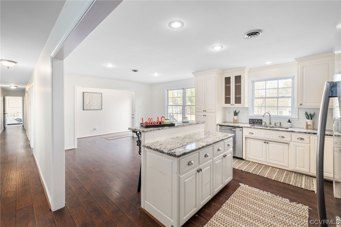3612 Chesdin Boulevard Sutherland, VA 23885 - Photo 15 of 44 a kitchen with granite countertop white cabinets and white appliances