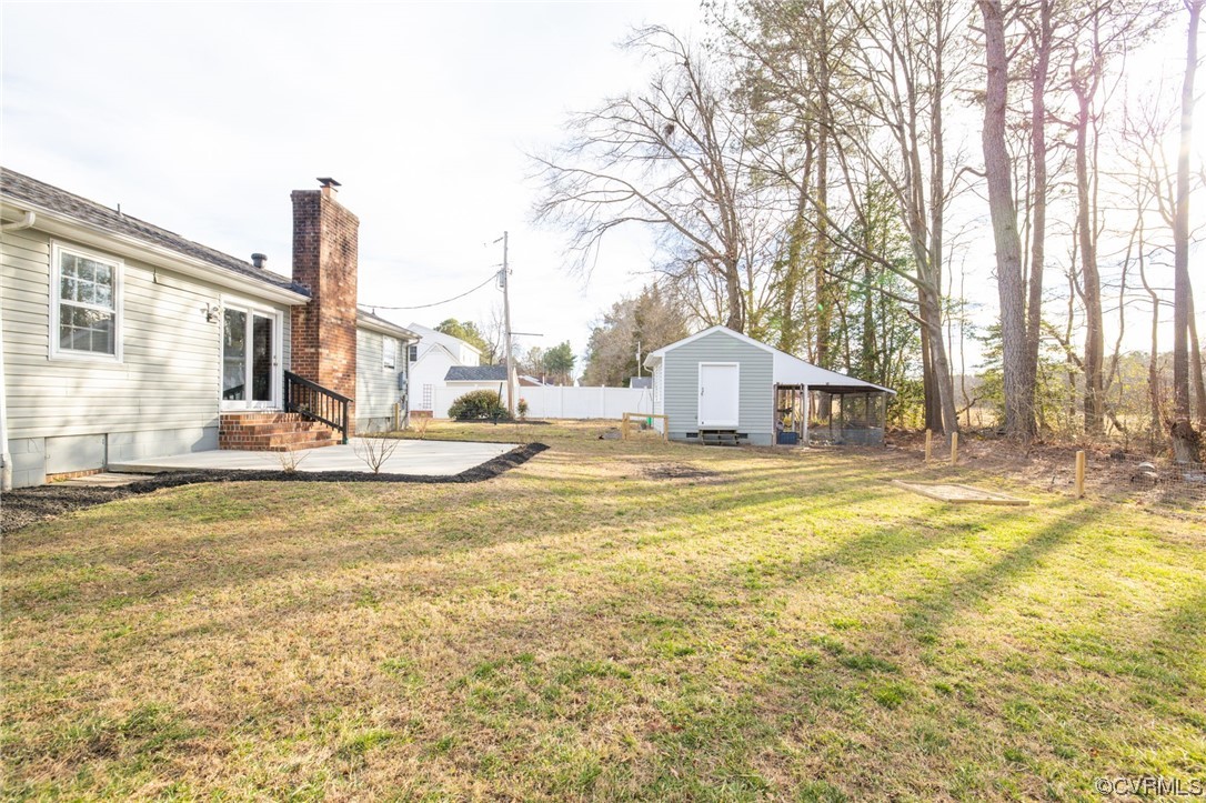 3612 Chesdin Boulevard Sutherland, VA 23885 - Photo 38 of 44 a view of a white house with a large pool and sitting area