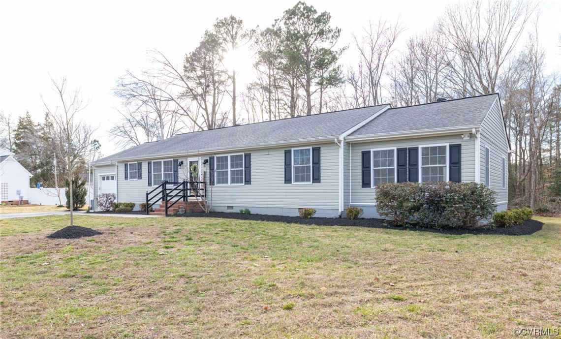 3612 Chesdin Boulevard Sutherland, VA 23885 - Photo 4 of 44 a view of a house with a yard