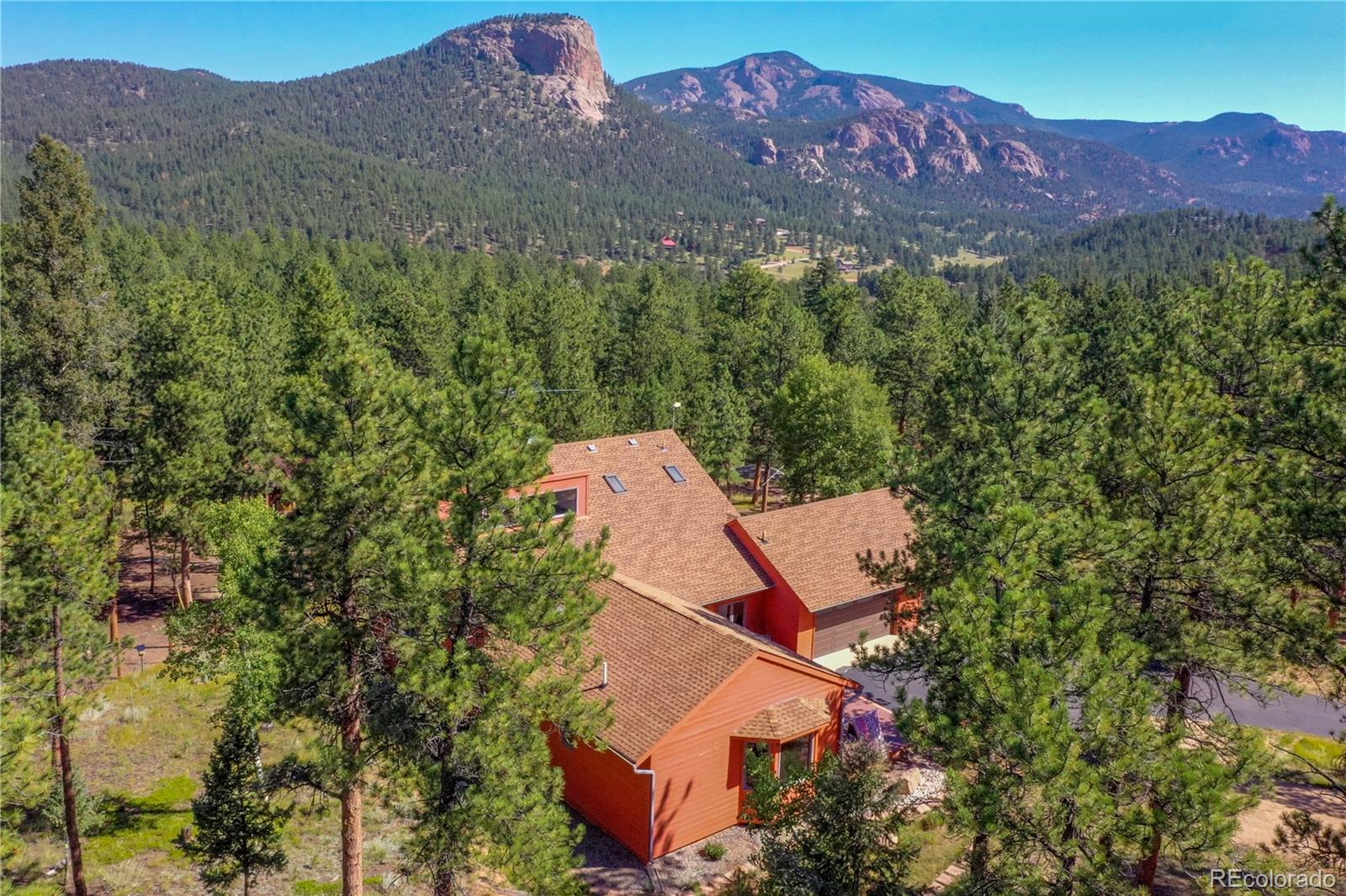 411 Spring Drive Pine, CO 80470 - Photo 6 of 40 an aerial view of a house