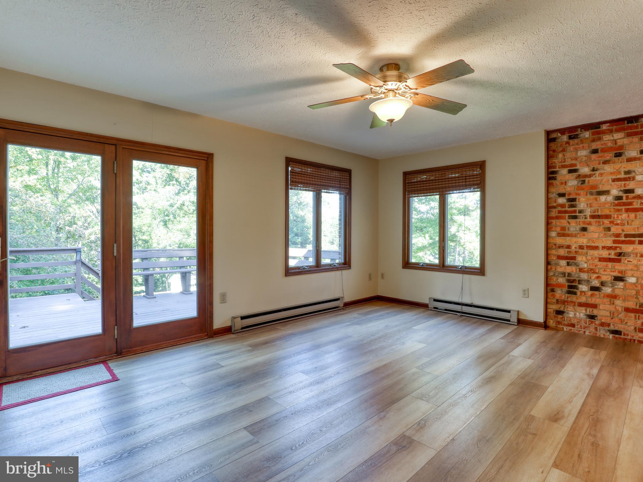 104 Forest Ridge Road Winchester, VA 22602 - Photo 13 of 46 Family room with LVP flooring