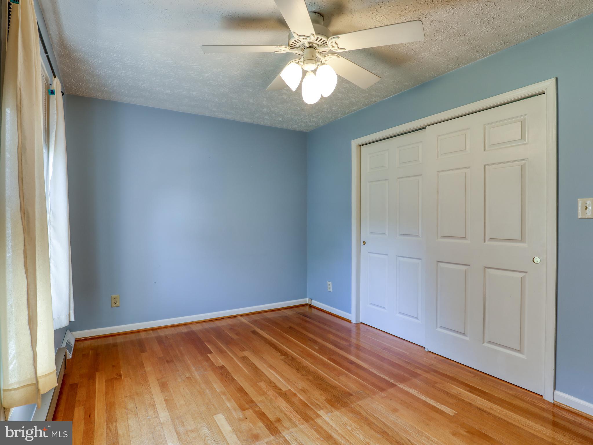 104 Forest Ridge Road Winchester, VA 22602 - Photo 23 of 46 3rd Bedroom with hardwood flooring