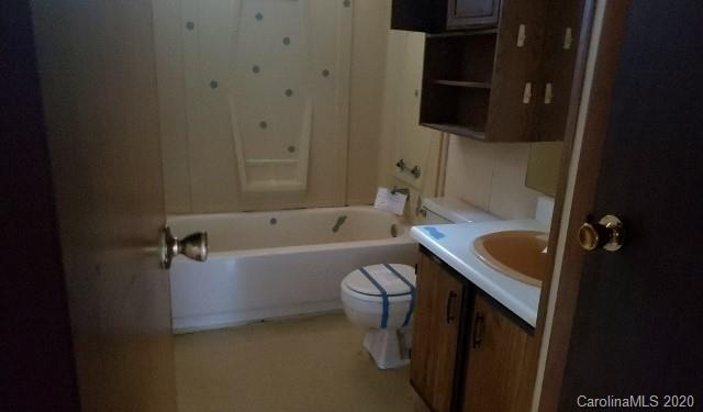 1285 Pitts Road Chester, SC 29706 - Photo 8 of 11 a bathroom with a sink a toilet and bathtub