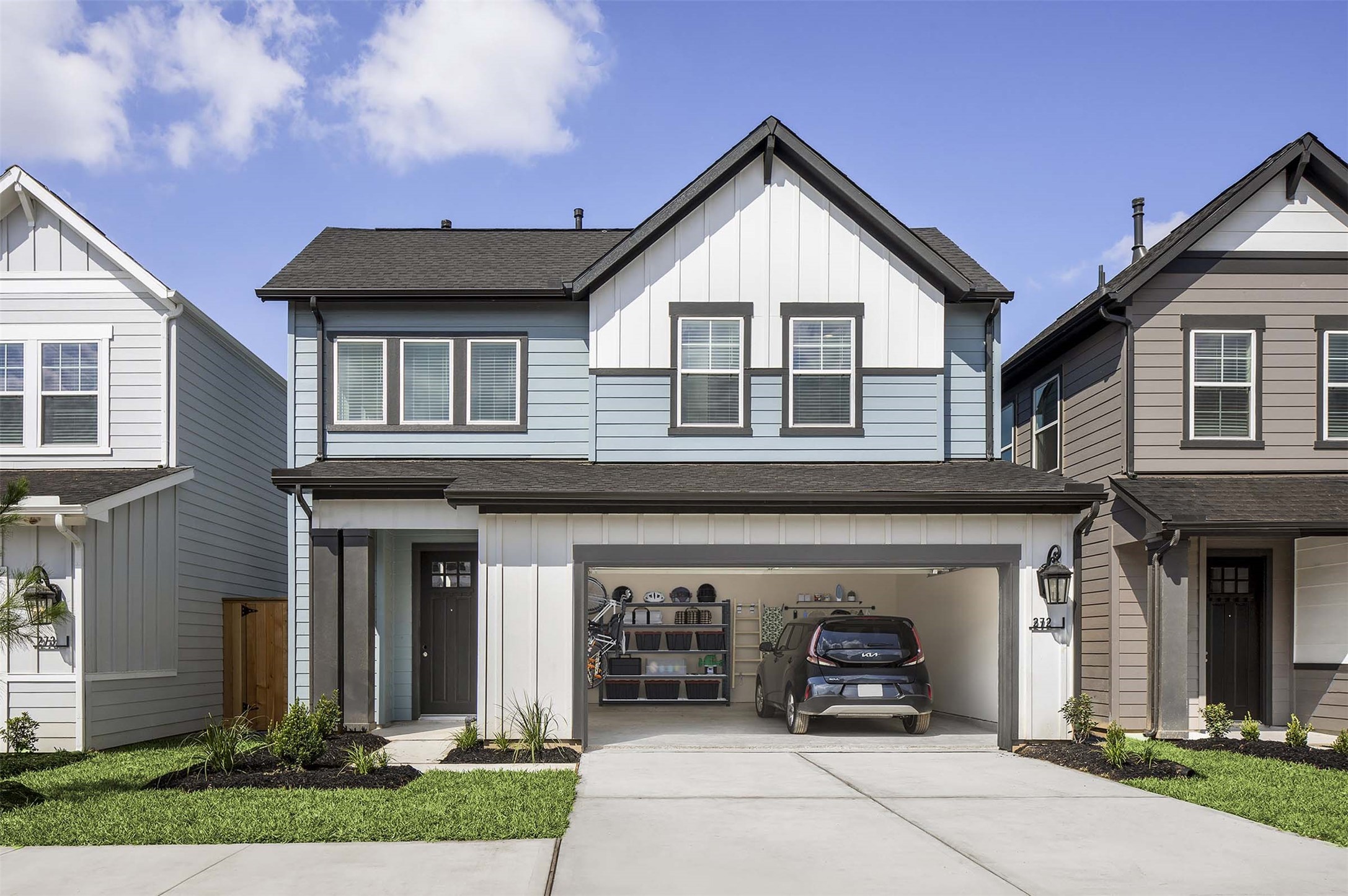 1840 Woodland Field Crossing, Unit 132 Spring, TX 77380 - Photo 3 of 19 a view of a house with entrance and a garden