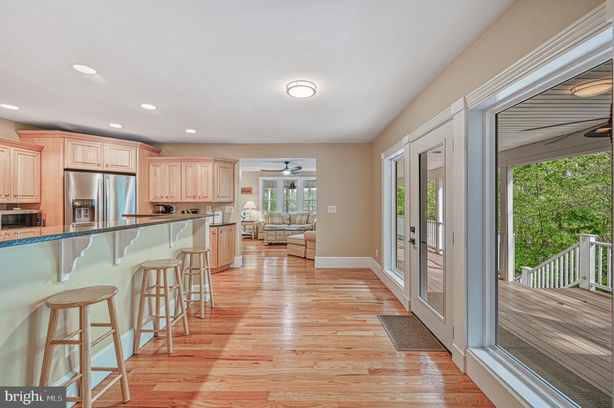 7320 Old Dickersons Road Orange, VA 22960 - Photo 15 of 119 a view of a kitchen with dining room wooden floor and windows
