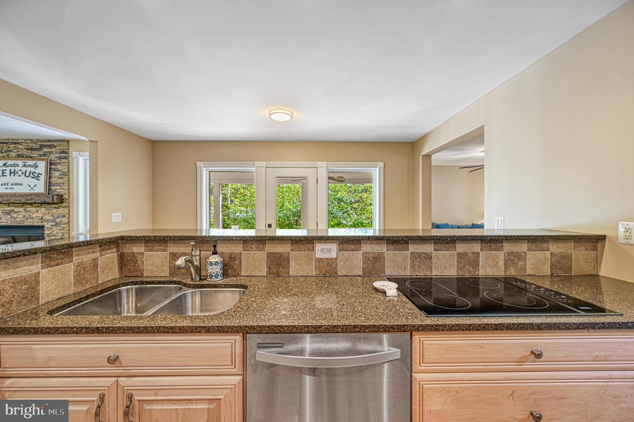 7320 Old Dickersons Road Orange, VA 22960 - Photo 20 of 119 a kitchen with granite countertop a sink and a window