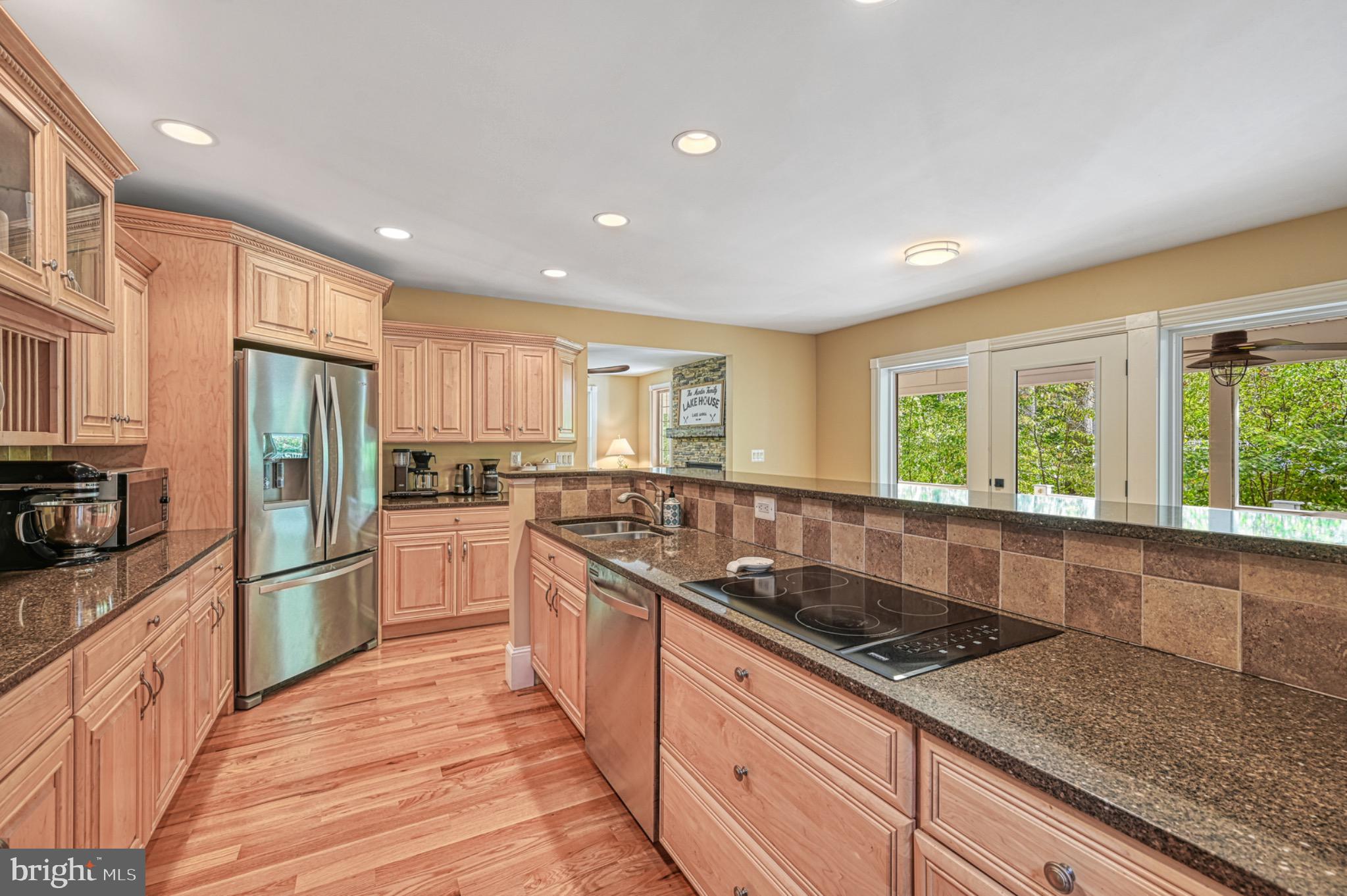 7320 Old Dickersons Road Orange, VA 22960 - Photo 21 of 119 a kitchen with stainless steel appliances granite countertop a sink stove and refrigerator