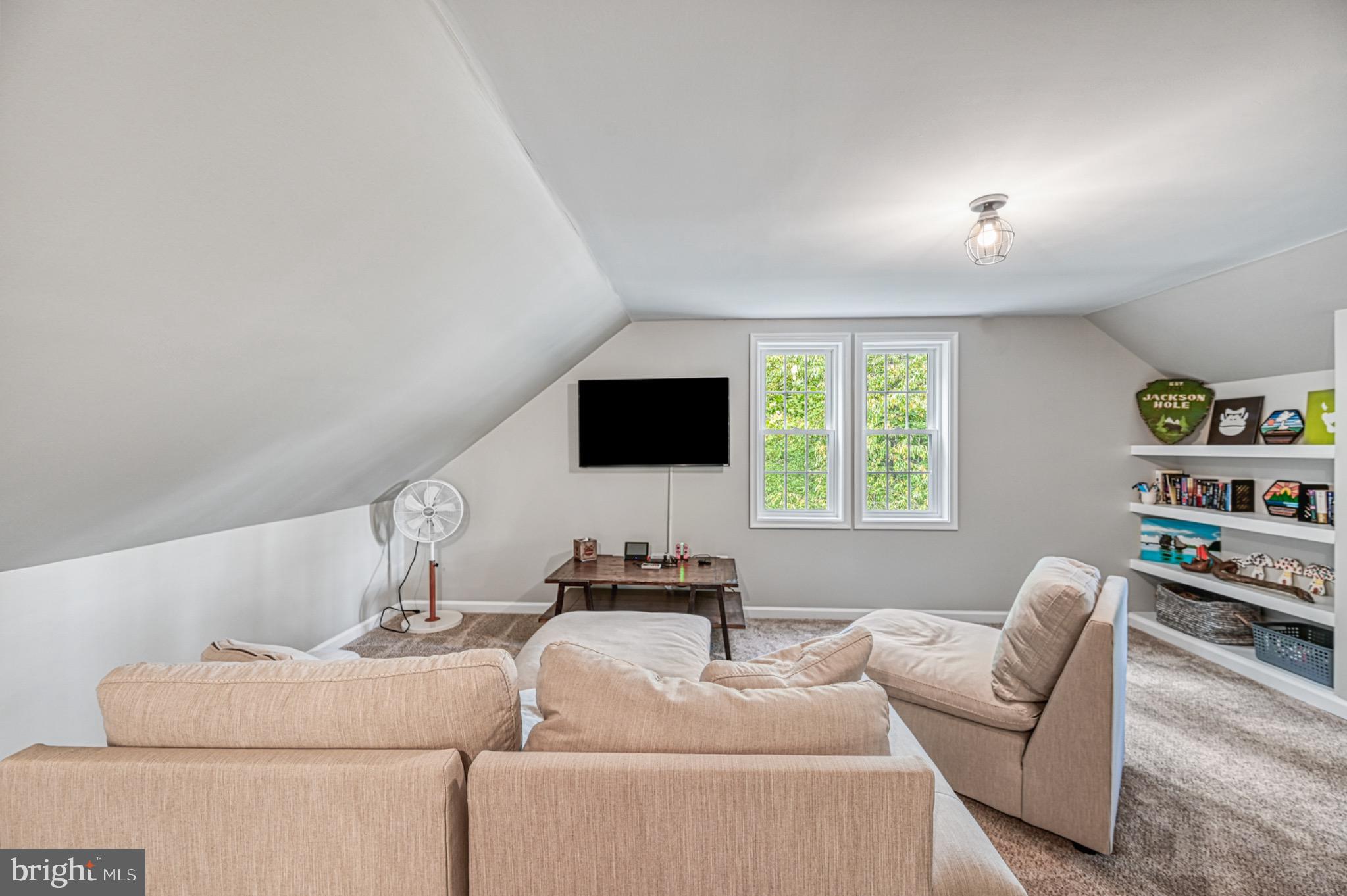 7320 Old Dickersons Road Orange, VA 22960 - Photo 59 of 119 a living room with furniture a window and a flat screen tv