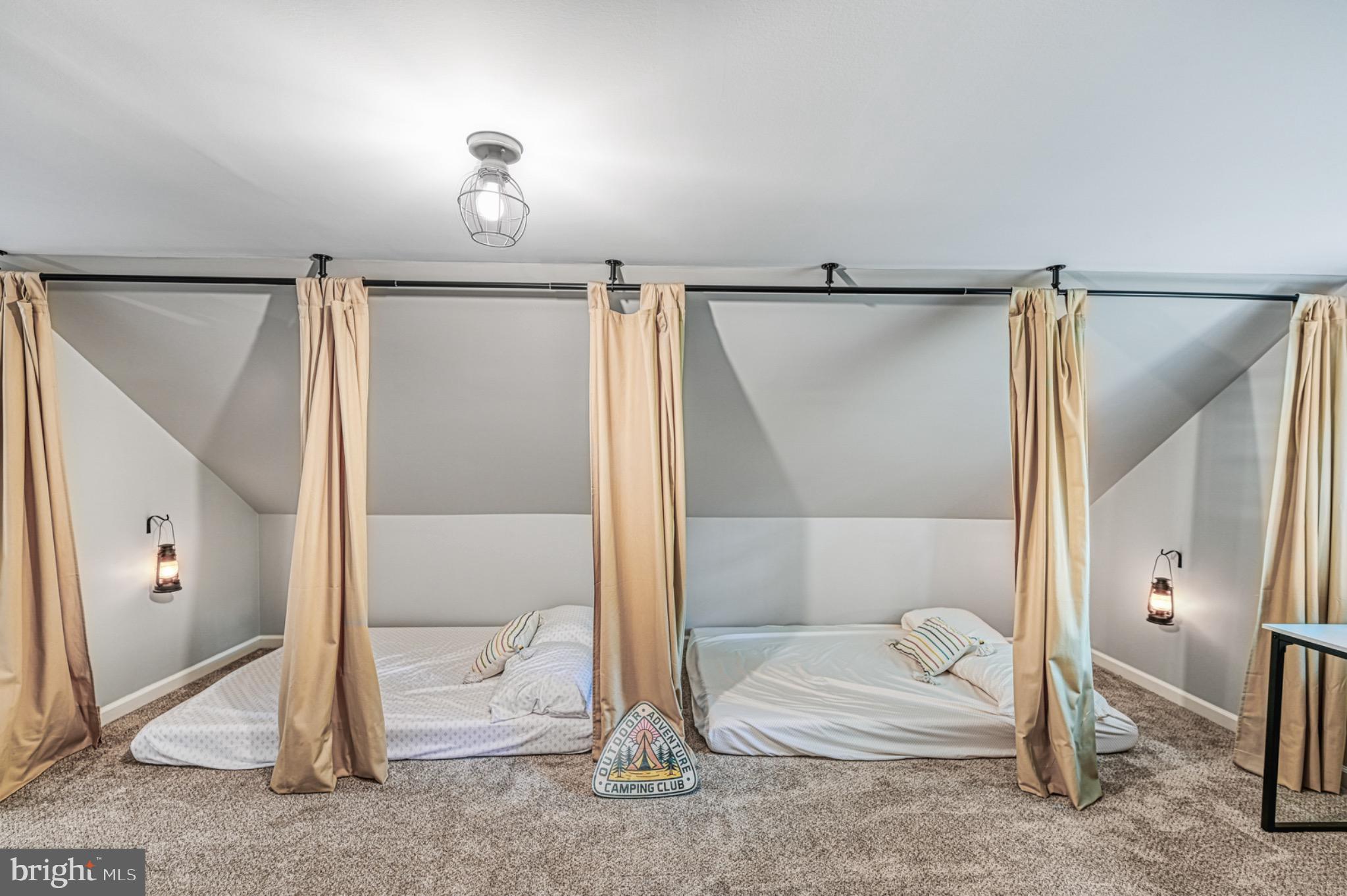 7320 Old Dickersons Road Orange, VA 22960 - Photo 65 of 119 Cozy attic retreat with charming privacy curtains.