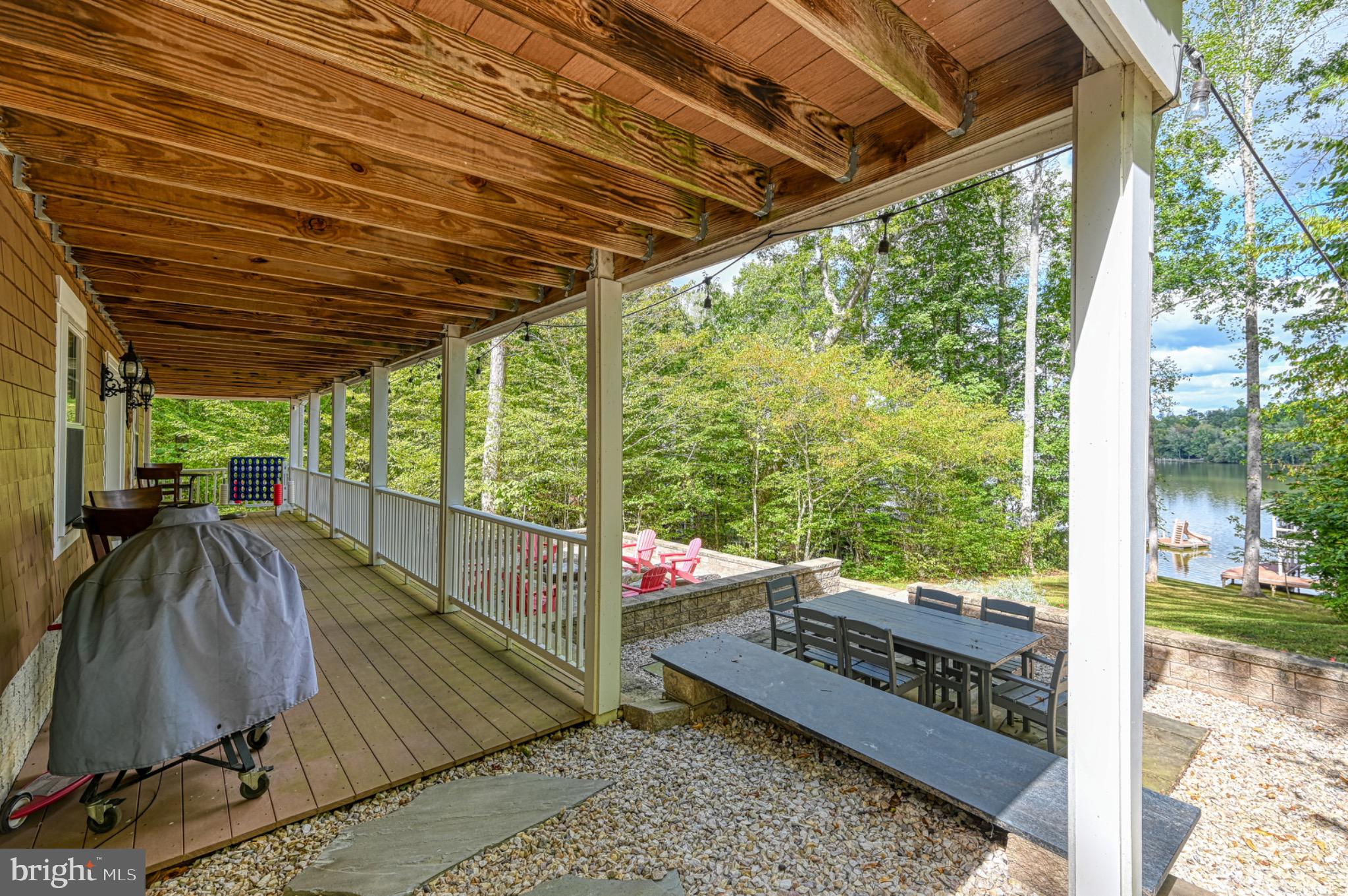 7320 Old Dickersons Road Orange, VA 22960 - Photo 83 of 119 Serene lakeside retreat with inviting porch.