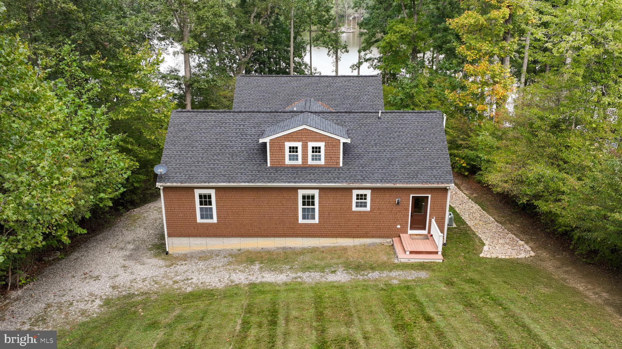 7320 Old Dickersons Road Orange, VA 22960 - Photo 87 of 119 a view of a house with a yard plants and large tree