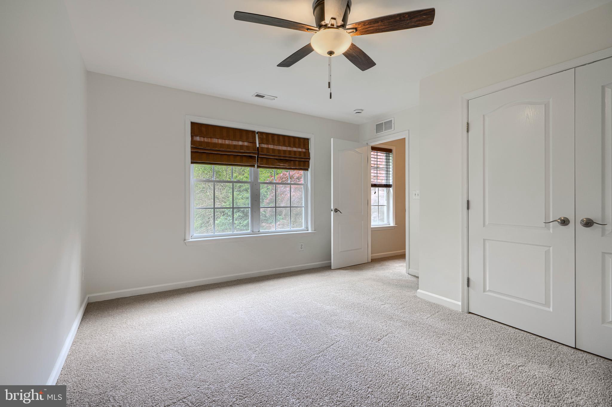 605 Paradise Road Aberdeen, MD 21001 - Photo 23 of 47 an empty room with windows and fan