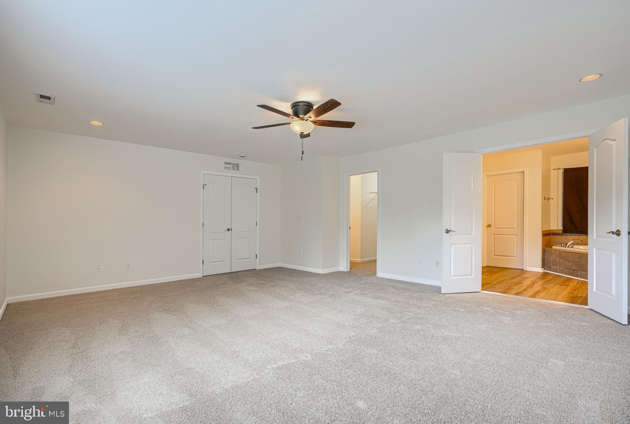 605 Paradise Road Aberdeen, MD 21001 - Photo 31 of 47 an empty room with closet and a ceiling fan