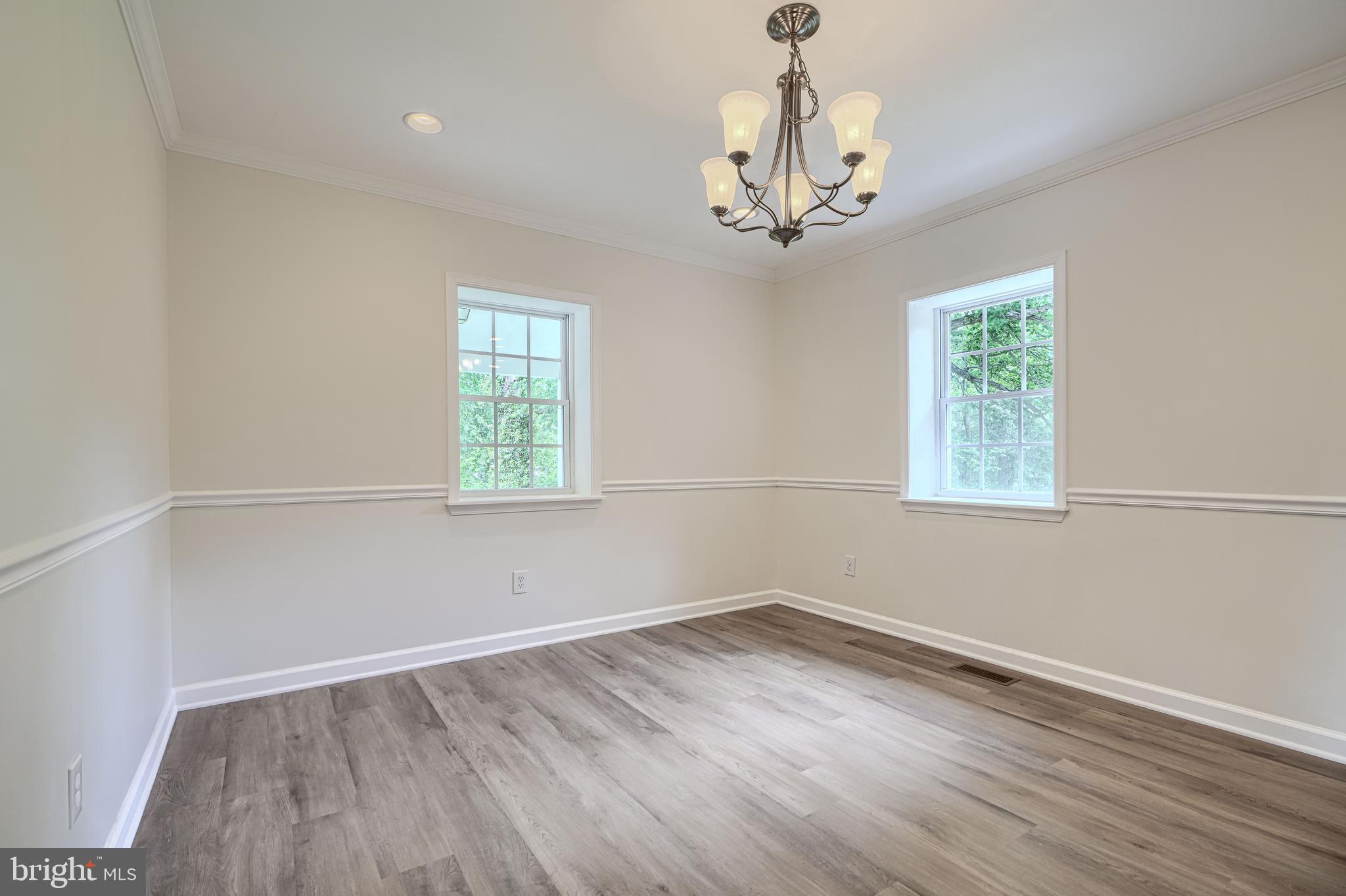 605 Paradise Road Aberdeen, MD 21001 - Photo 8 of 47 wooden floor in an empty room with a window