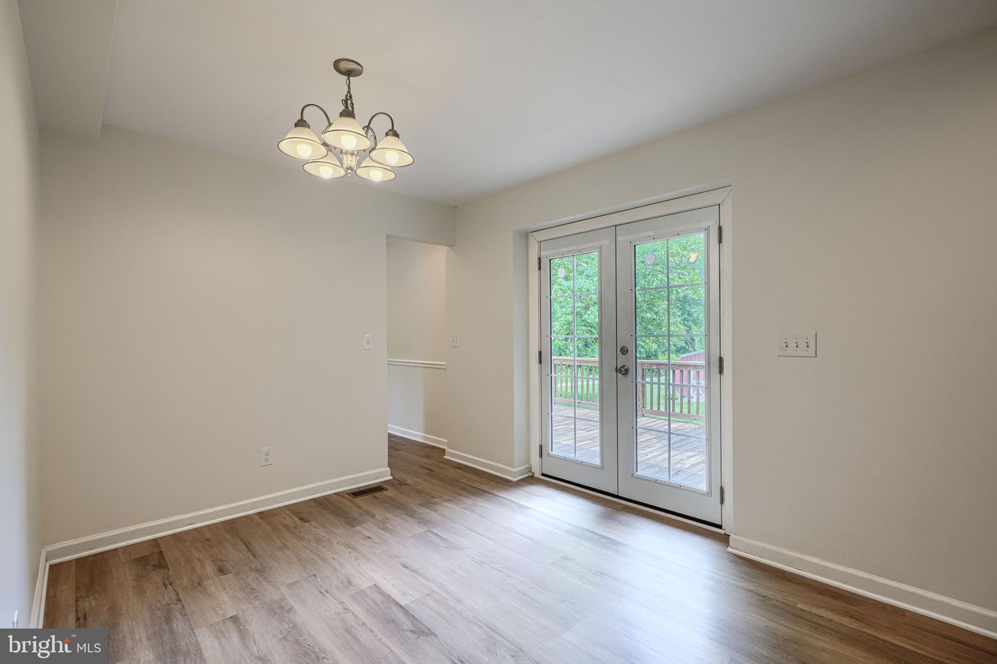 605 Paradise Road Aberdeen, MD 21001 - Photo 10 of 47 wooden floor in an empty room with a window