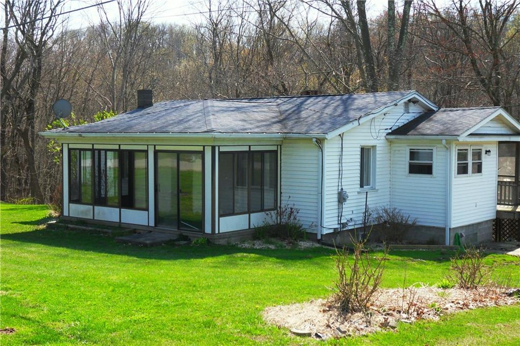 a view of a house with a garden